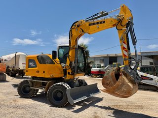 Excavadora de ruedas Liebherr A910 Compact