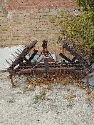 Rastra de muelles agrícola
