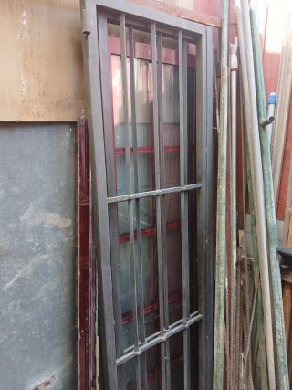 Reja de puerta hierro 64 más 64..y 212 alto