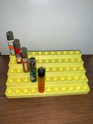 Suporte para isqueiros Clipper