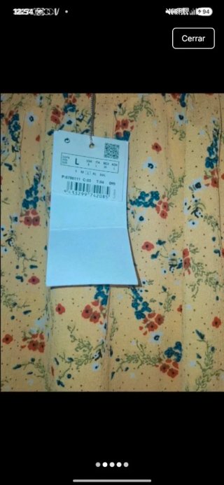 Blusa amarilla Milano L con estampado floral.Etiqu