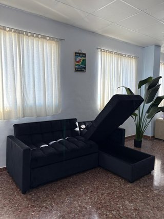 Nuevo sofá cama negro con chaise longue