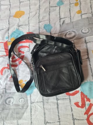 Bandolera negra multibolsillos
