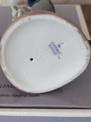 Figura en porcelana Lladro de chico estudiante
