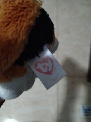 Peluche gato ojos brillantes