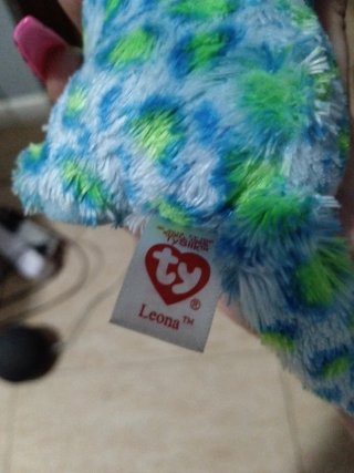 Peluche ojos brillantes azul y verde