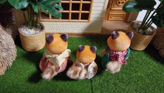 Familia Panda Rojo Sylvanian Families