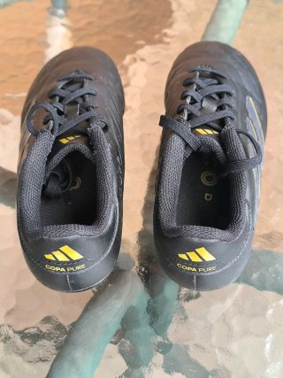 Botas de fútbol Adidas Copa Negras y Doradas