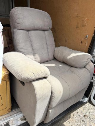 Sillón abatible de tela gris