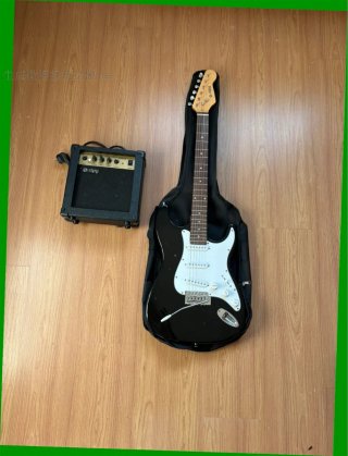 Guitarra Zipy Negra + Amplificador