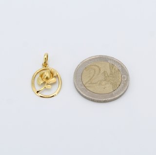 Colgante de oro de 18k. Peso: 1.45 gr.
