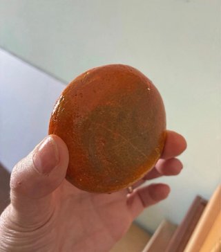 Sasso dipinto a mano: Arancia