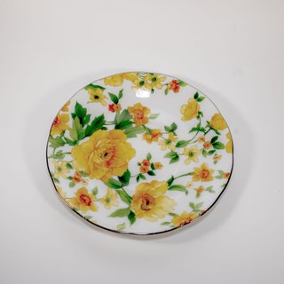 Taza flores de porcelana con platillos