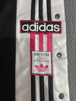 Pantaloni adidas Adibreak con bottoni automatici