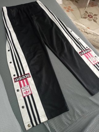 Pantaloni adidas Adibreak con bottoni automatici