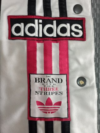 Pantaloni adidas Adibreak con bottoni automatici