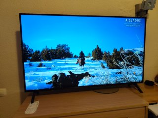 Televisor UHD AI de 75/55