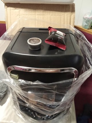 Cafetera de cápsulas negra