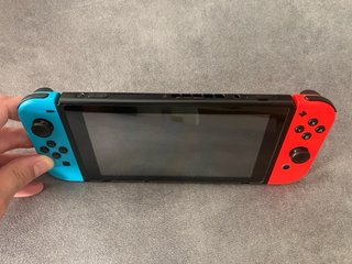 Nintendo Switch Azul/Rojo + Funda