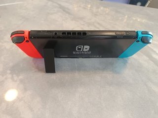 Nintendo Switch Blu/Arancione + Accessori