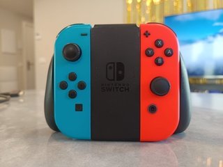 Nintendo Switch Blu/Arancione + Accessori