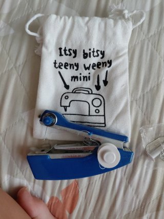 Máquina de coser de mano azul Tiger