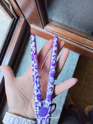 Mini piastra da viaggio viola e bianca