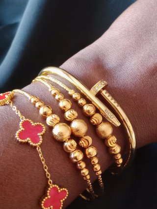 Bracciali donna oro e rosso