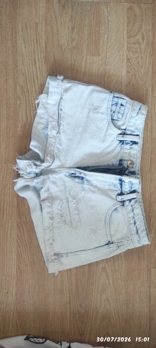 Shorts vaqueros desgastados mujer