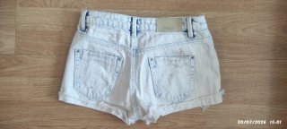 Shorts vaqueros desgastados mujer