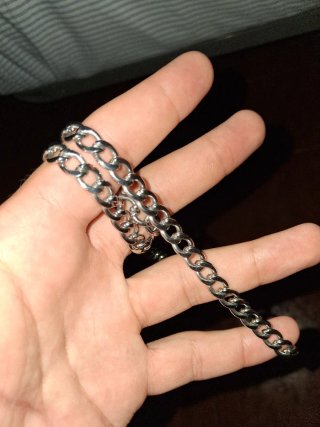 Catena a maglie dorata e argentata