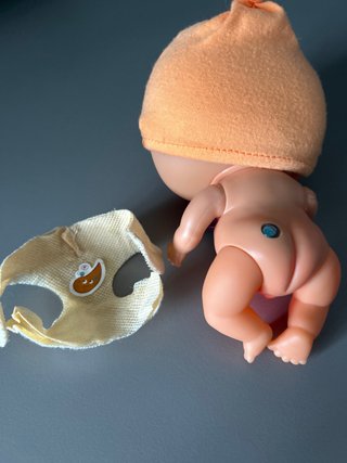 Muñeco Bellie con gorro y chupete