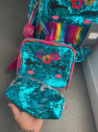 Mochila nueva . Con estuche y porta alimentos.