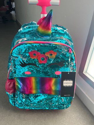 Mochila nueva . Con estuche y porta alimentos.