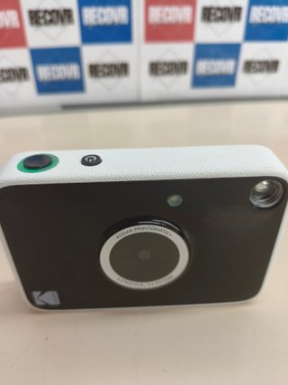 Cámara instantánea Kodak Printomatic+ 10MP con impresión de fotos Zink negra