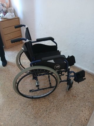 Silla de ruedas como nueva