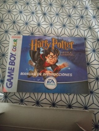 Caja y manual Harry Potter y la piedra filosofal