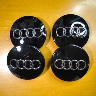 TAPABUJES AUDI 68mm NEGRO - EMBLEMA LLANTAS AUDI