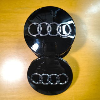 TAPABUJES AUDI 68mm NEGRO - EMBLEMA LLANTAS AUDI