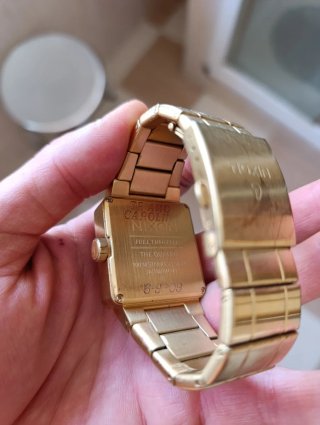 Reloj Nixon Dorado y marron