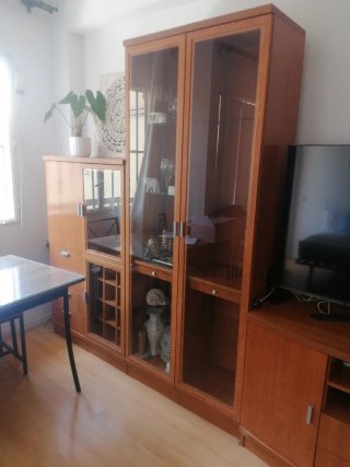 Mueble de salón madera y cristal
