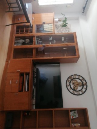 Mueble de salón madera y cristal