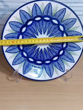 Plato decorativo de cerámica azul