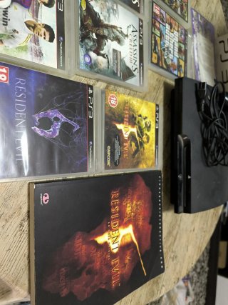 PS3 con confezione ORIGINALE + 2 Controller + Giochi + Guida