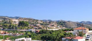 Terreno con cortijo y nave