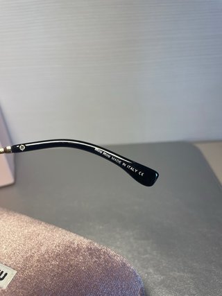 Gafas de Sol Miu Miu Negras y Doradas
