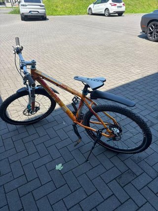 Bicicleta Montaña Naranja y Blanca