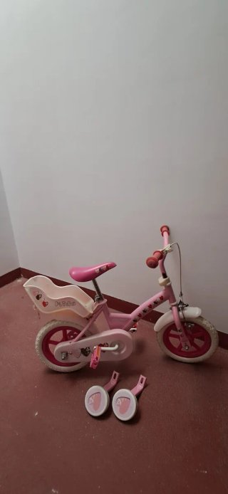 Bicicleta infantil niña rosa con ruedines