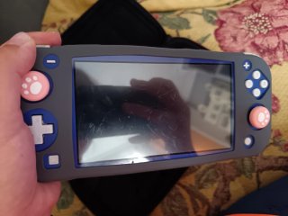 Nintendo Switch Lite Morada + Accesorios