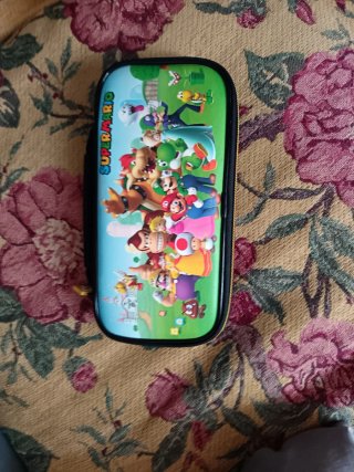 Nintendo Switch Lite Morada + Accesorios